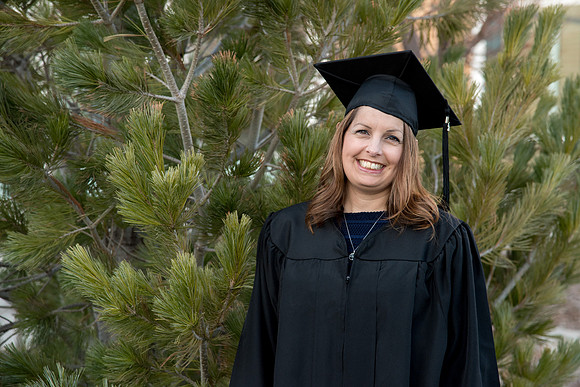 BYU-Idaho graduates with their family after the commencement service.