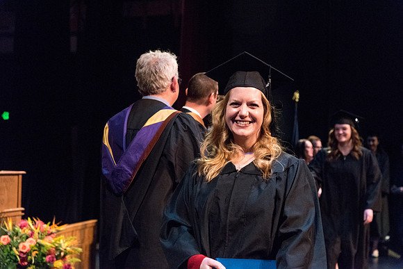 BYU-Idaho graduates from the College of Performaing and Visual Arts convocation receive their diplomas.
