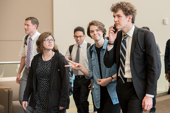 Students crowd before the devotional at the first day of Spring semester.