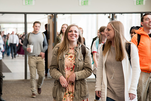 Students crowd before the devotional at the first day of Spring semester.