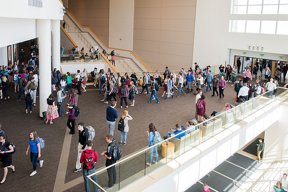 Students crowd before the devotional at the first day of Spring semester.