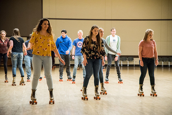 Rexburg YSA 20th Ward opening social. Rollerskating and pizza in the Manwaring Center Ballroom. April 2018