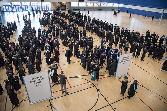 Graduates meet in the I-Center Courts for Processional before Commencement begins. April 2018