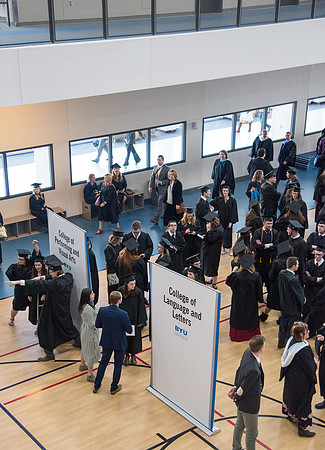 Graduates meet in the I-Center Courts for Processional before Commencement begins. April 2018