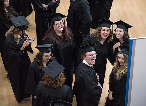 Graduates meet in the I-Center Courts for Processional before Commencement begins. April 2018