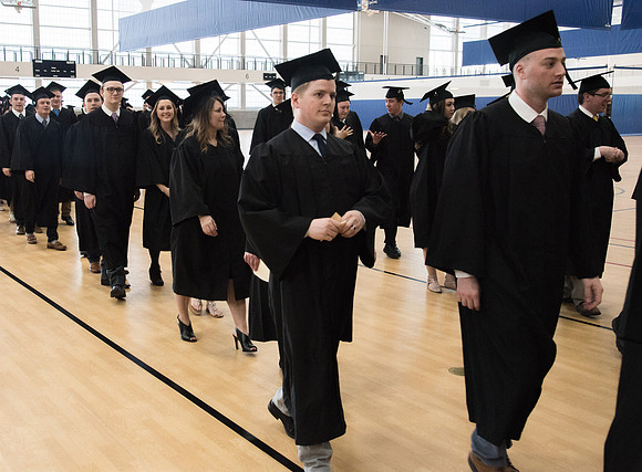 Graduates meet in the I-Center Courts for Processional before Commencement begins. April 2018