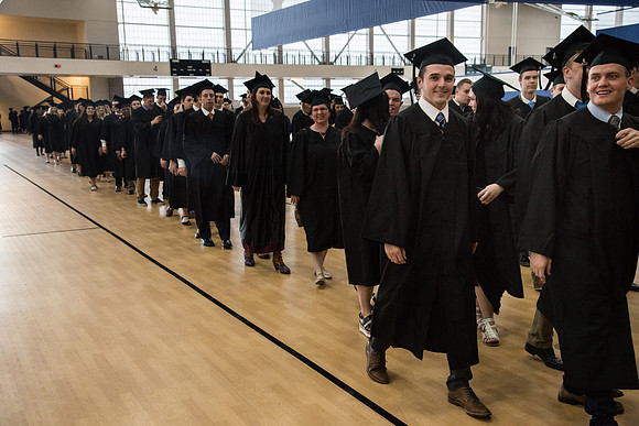 Graduates meet in the I-Center Courts for Processional before Commencement begins. April 2018