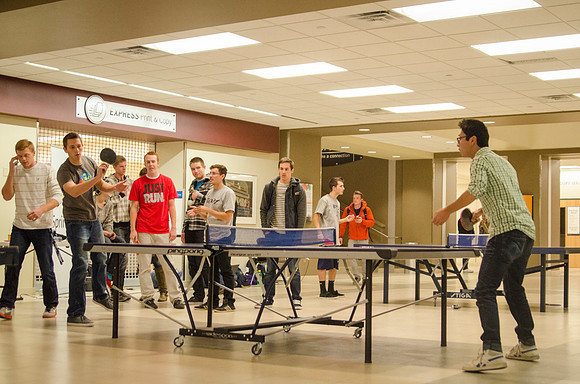 BYU-Idaho students participate in a ping pong tournament held in the Manwaring Center