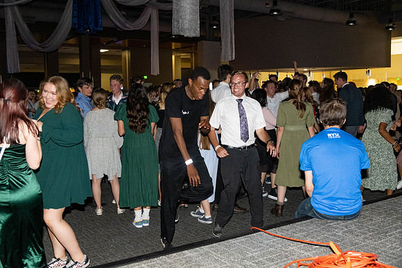 Students dance in the Manwaring Center Court.