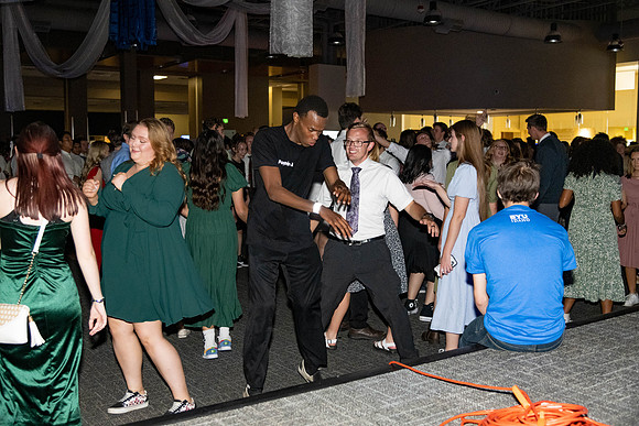 Students dance in the Manwaring Center Court.