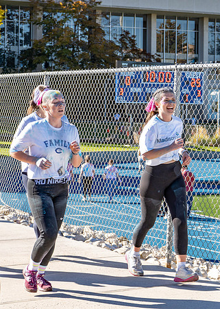Students participate in the color run during spirit week, with free pancakes to follow.
