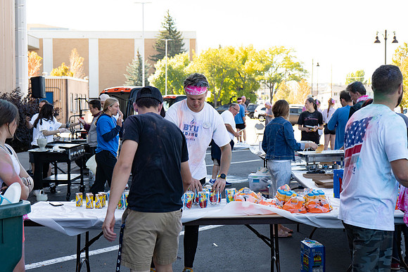 Students participate in the color run during spirit week, with free pancakes to follow.