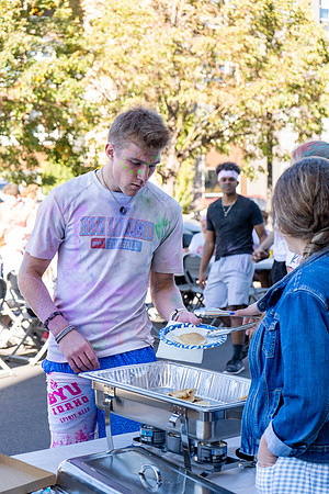 Students participate in the color run during spirit week, with free pancakes to follow.
