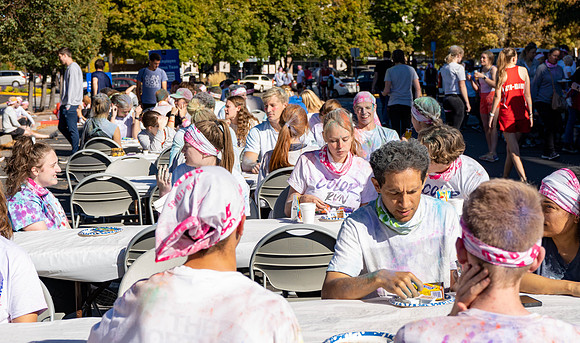 Students participate in the color run during spirit week, with free pancakes to follow.