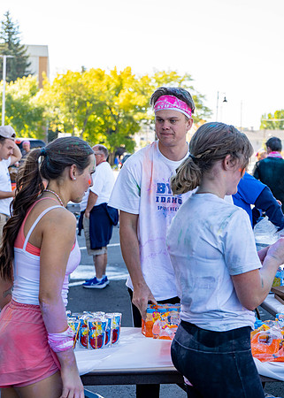 Students participate in the color run during spirit week, with free pancakes to follow.