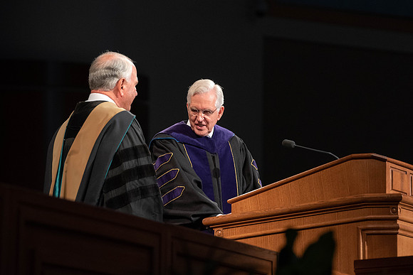 President Alvin F. Meredith's Inauguration. Elder Rasband and Elder Christofferson present the medallion.