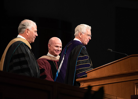 President Alvin F. Meredith's Inauguration. Elder Rasband and Elder Christofferson present the medallion.