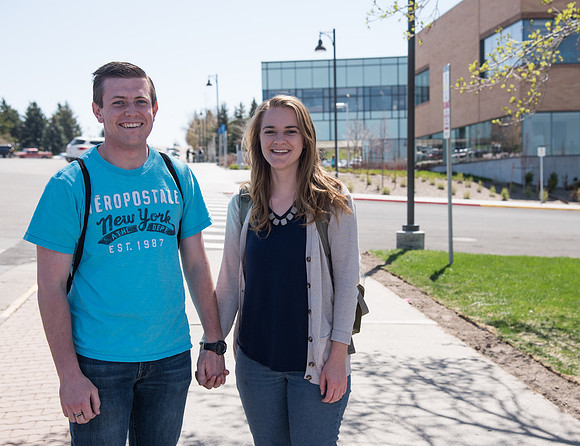 Students on campus by the Science & Technology Center Building, Spring Semester. April 2018