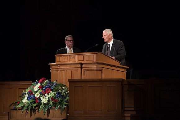 Jeffery R. Holland invites Elder Bradford C. Bowen to help answer a question that the married students asked in the I-Center. May 2018