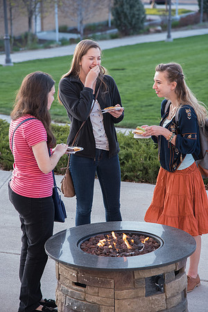 Students get refreshments outside of the Jacob Spori Gallery for the Body and Meaning Exhibit Reception. May 2018