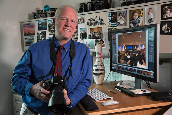 Mike Lewis, University Relations Photography Coordinator in his office. May 2018