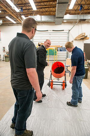 Civil engineering students work with different mixtures of cement to make a light, yet durable, cement that will be the building material for a canoe.