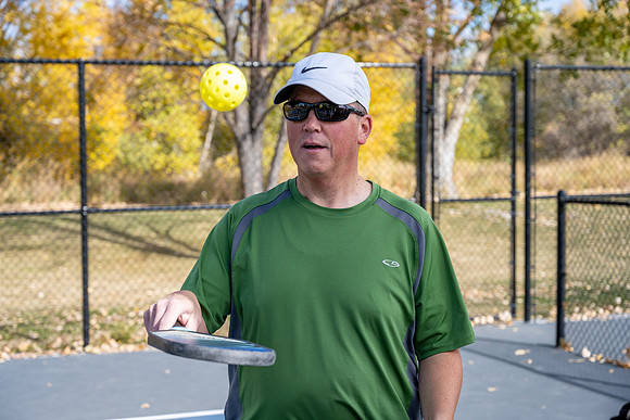 Dinking around playing pickleball for the HR Wellness Video.