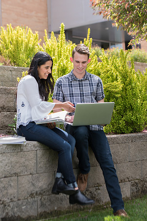 BYU-Idaho Campus and students walking for the Be Smart pamphlet.