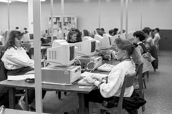 Students work in the Computer Lab on campus. November 1990.