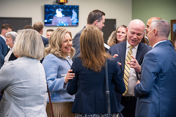 Many board members, faculty, family, and prominent church figures attend the inaugural reception before the inauguration of Alvin F. Meredith.