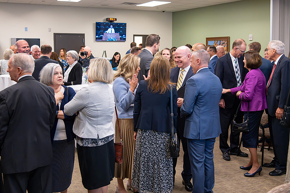 Many board members, faculty, family, and prominent church figures attend the inaugural reception before the inauguration of Alvin F. Meredith.