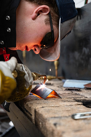 Students working in the welding lab.