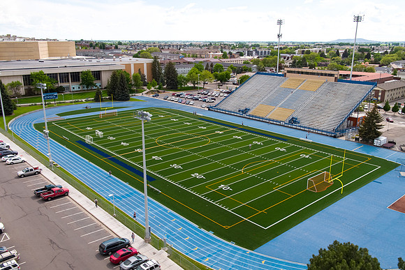 Drone aerial of BYU-Idaho campus football stadium.