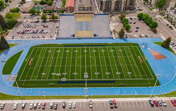Drone aerial of BYU-Idaho campus football stadium.