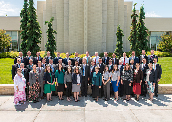 President Gilbert and his team of Pathway employees in front of the Taylor Building.
