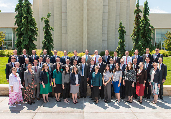 President Gilbert and his team of Pathway employees in front of the Taylor Building.