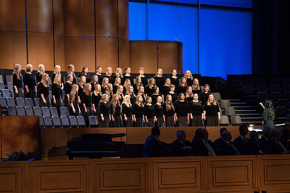 Women's Glee Choir sings in Devotional in the I-Center.