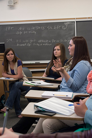 A student comments during Brother Robert's Sociology class during the 2014 Spring Semester.