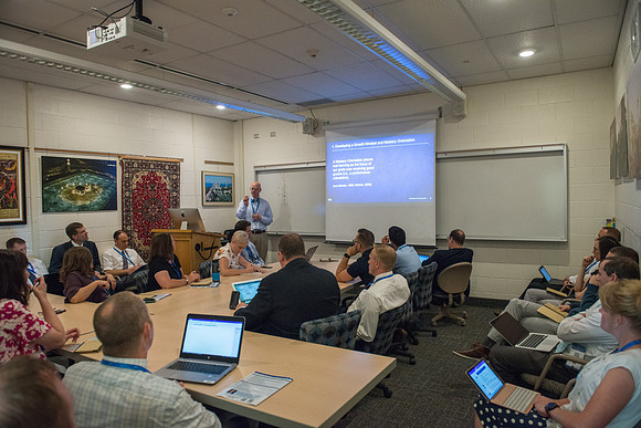 BYU-Idaho Online instructors meet on campus for a conference. The theme is "Building A Community of Learners"