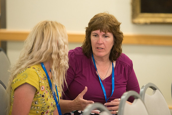 BYU-Idaho Online instructors meet on campus for a conference. The theme is "Building A Community of Learners"