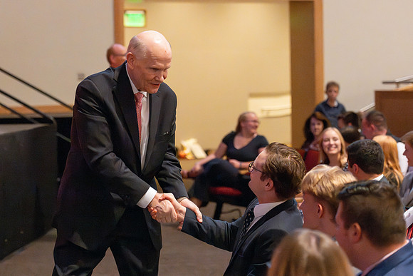 Elder Renlund and his wife Ruth, address BYU-Idaho students in the I-Center.