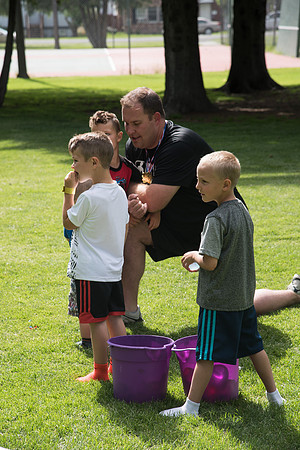 Student Living department employees and their families enjoy a picnic at Smith Park, to celebrate 10 years of being an organization.