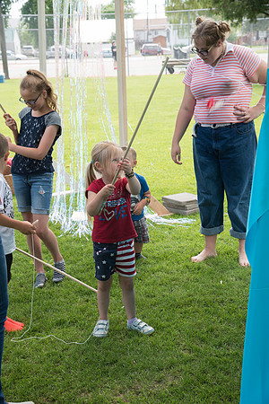 Student Living department employees and their families enjoy a picnic at Smith Park, to celebrate 10 years of being an organization.