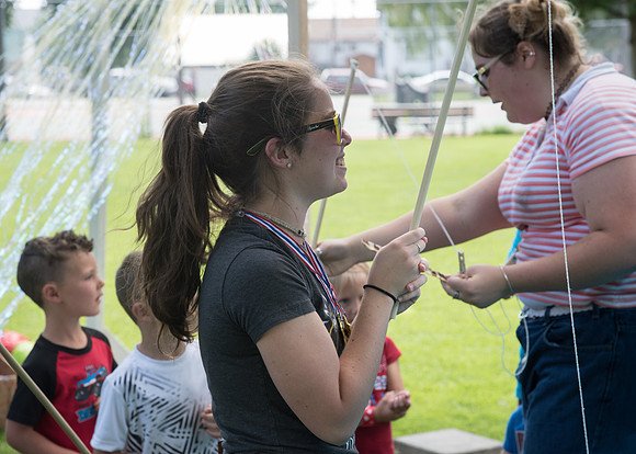 Student Living department employees and their families enjoy a picnic at Smith Park, to celebrate 10 years of being an organization.