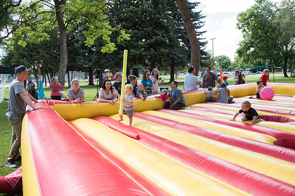 Student Living department employees and their families enjoy a picnic at Smith Park, to celebrate 10 years of being an organization.