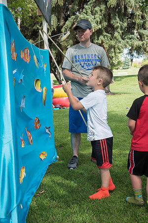 Student Living department employees and their families enjoy a picnic at Smith Park, to celebrate 10 years of being an organization.