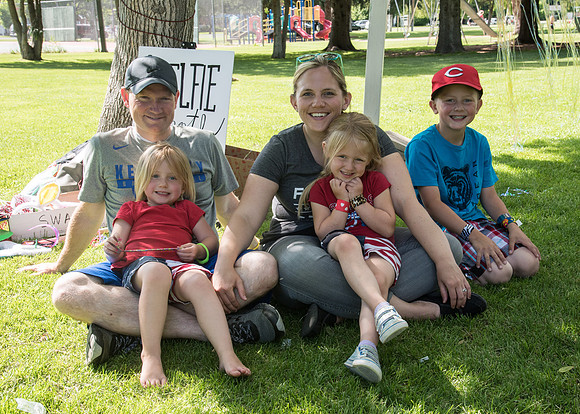 Student Living department employees and their families enjoy a picnic at Smith Park, to celebrate 10 years of being an organization.