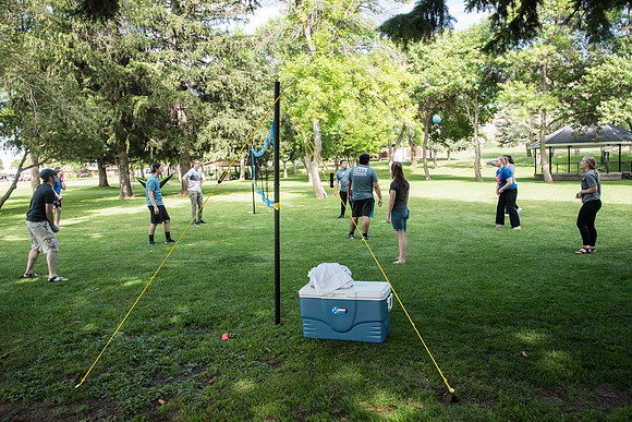 Student Living department employees and their families enjoy a picnic at Smith Park, to celebrate 10 years of being an organization.