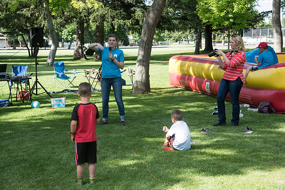 Student Living department employees and their families enjoy a picnic at Smith Park, to celebrate 10 years of being an organization.