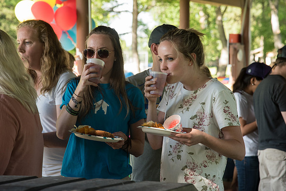 Student Living department employees and their families enjoy a picnic at Smith Park, to celebrate 10 years of being an organization.